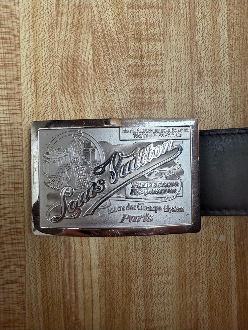 Louis Vuitton traveling requisites silver belt.
